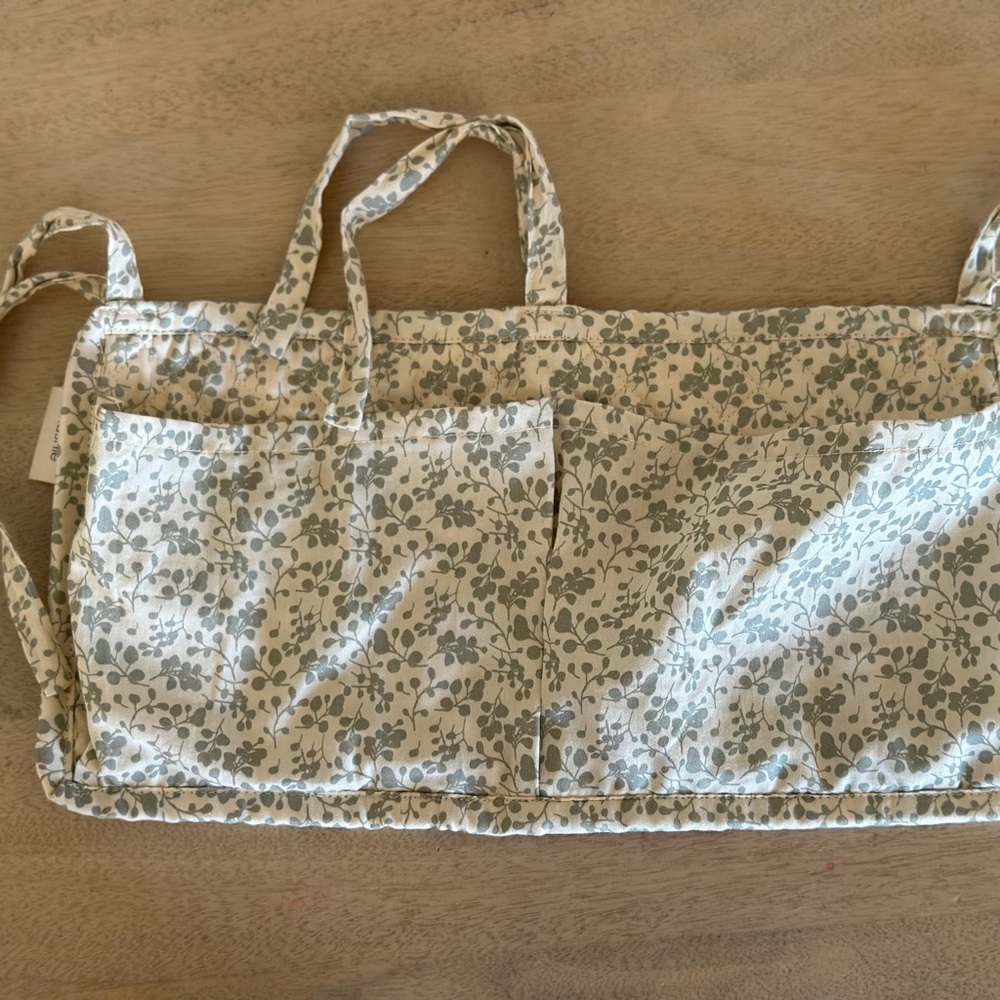 Mushie  crib pocket floral